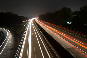 Fototapeta na wymiar german autobahn traffic lights at night