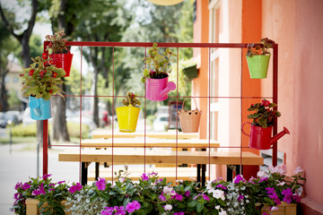 Fototapeta na wymiar Beautiful idea for flower pots in garden