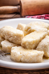 Lazy dumplings with sugar.