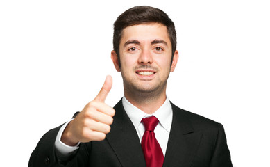 Portrait of a smiling happy man giving thumbs up
