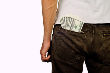 Man stands with the money in the back pocket isolated on white