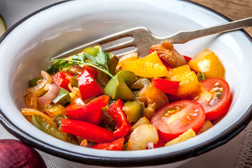 Ratatouille on a rustic table.
