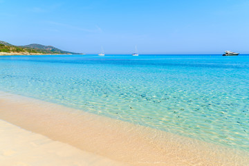 Fototapeta na wymiar Azure sea water on Saleccia beach near Saint Florent, Corsica island, France
