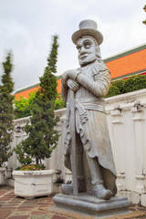 European giant statue at Wat Pho temple, Bangkok, Thailand