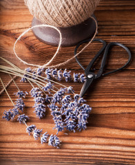 dried lavender bunches on dark wooden table