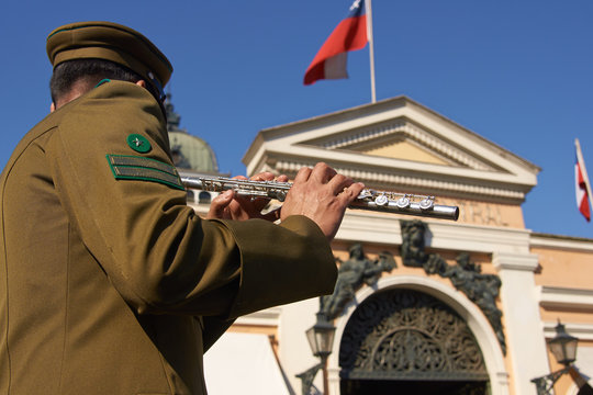 Carabinero music band playing outside the historic fish market in the centre of Santiago in Chile.
