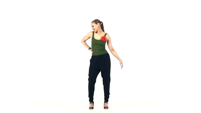 Beautiful latina dancer in action, on white, slow motion