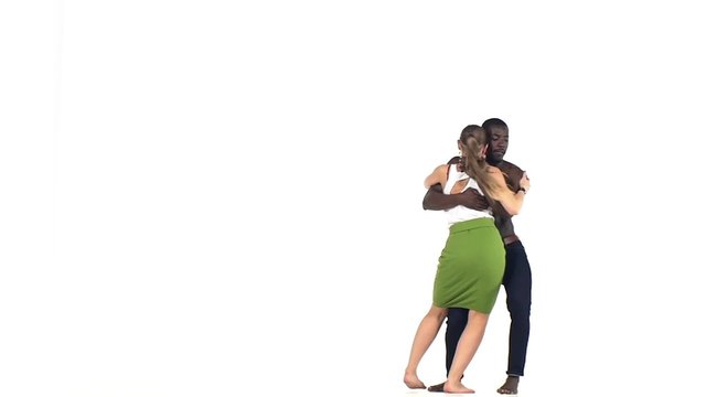 Social latino dancers, european girl and afro american man go on