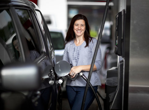 Woman At Gas Station