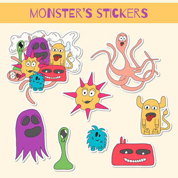 Set of stickers with doodle monsters.