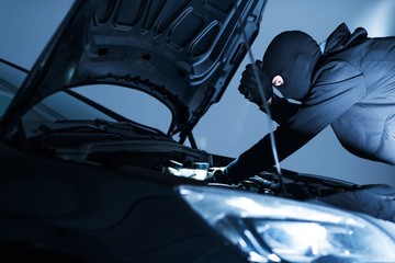 Robber Disabling Car Alarm