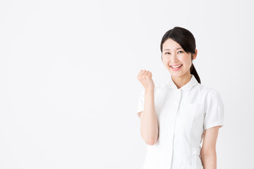 young asian nurse on white background