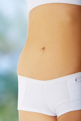Fototapeta na wymiar Woman's healthy belly