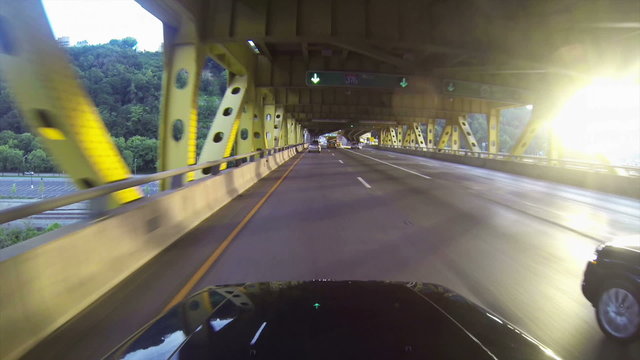 3368 A high-angle perspective of driving into the Fort Pitt Tunnels leaving downtown Pittsburgh, Pennsylvania.	