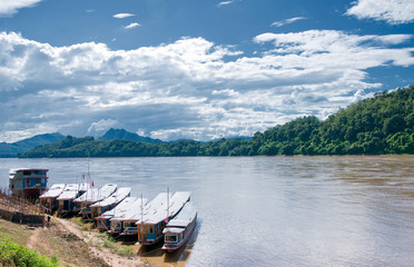 Naklejka na ściany i meble Boat wharf at Mekong river, Luang Prabang, Laos