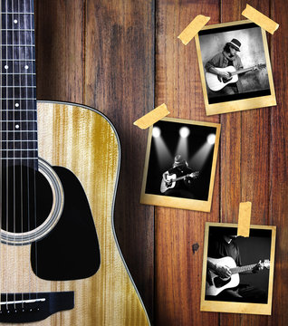 Guitar and guitarist photo photo frame on wood background.