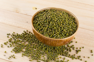 green beans on wood background