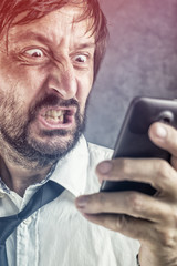 Angry businessman received frustrating SMS message
