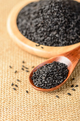 black sesame in the wooden spoon, (large depth of field, taken with tilt shift lens)
