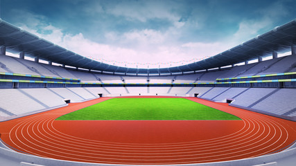 empty athletics stadium with track and grass field at front day view
