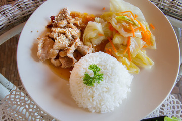 Teriyaki pork and broccoli stir fry with rice. the toning. selective focus