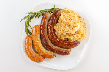 Oktoberfest menu, plate of sausages and sauerkraut