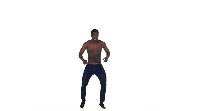 Afro american man dancer with naked torso starting dancing