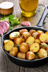 Fried potato in pan