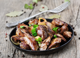 Roasted chicken liver in frying pan