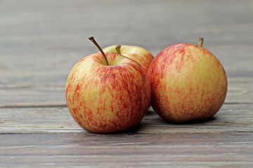 sweet apple fruit on wooden floor