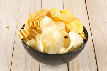 potato chips on wood background