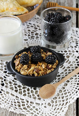 Homemade granola with yogurt and blackberry, healthy breakfast