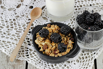 Homemade granola with yogurt and blackberry, healthy breakfast