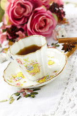 Fototapeta na wymiar Antique tea cup on the table