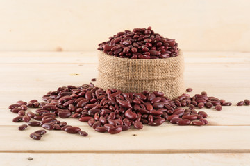 red  beans on wood background