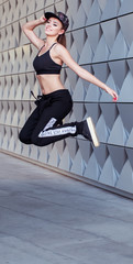 Female Hip Hop Dancer Jumping in the Air