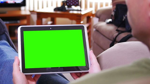 Man with Green Screen Tablet PC