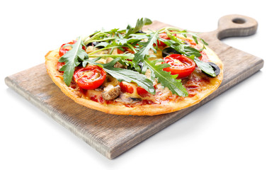 Tasty pizza with vegetables and arugula on cutting board isolated on white