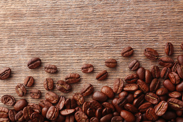 Coffee beans on wooden background