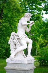 Fototapeta premium Sculptures of Uzutrakis manor on the board of Galves lake
