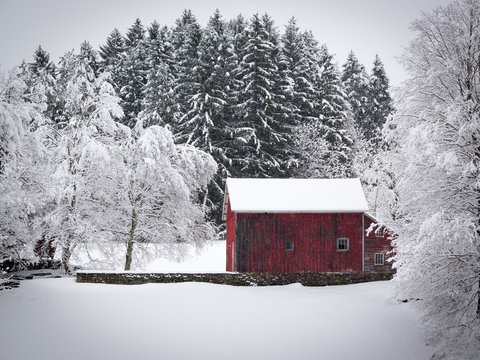 Old Red Barn on Snowy Hill