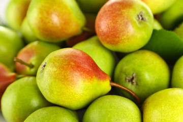 Heap of ripe tasty pears close up