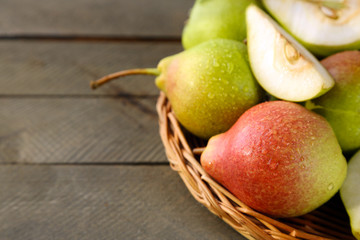 Ripe tasty pears on table close up