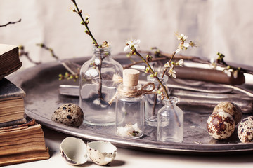 Easter interior with vials and quail eggs