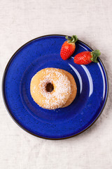 Sugar donuts with fresh strawberries