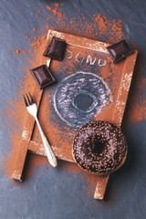 Donut with fresh strawberries and chocolate
