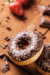 Donuts with fresh strawberries and chocolate