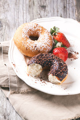 Donuts with fresh strawberries