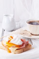 Breakfast with coffee and toast with cheese and egg