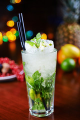 bright delicious refreshing mojito cocktail on a table in the
